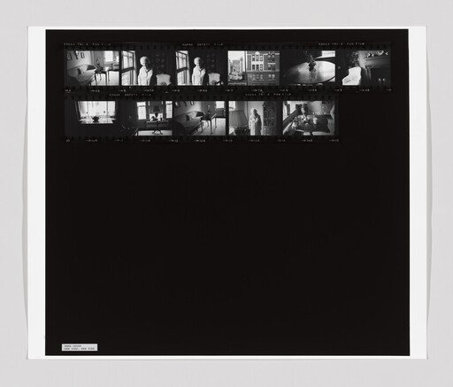 Contact sheet showing black-and-white film strips of a person in domestic interior and window views.