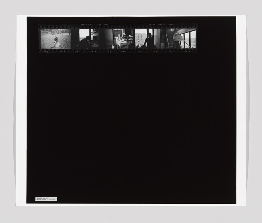 Five small black-and-white film frames show a person outdoors and people working or standing by windows indoors.