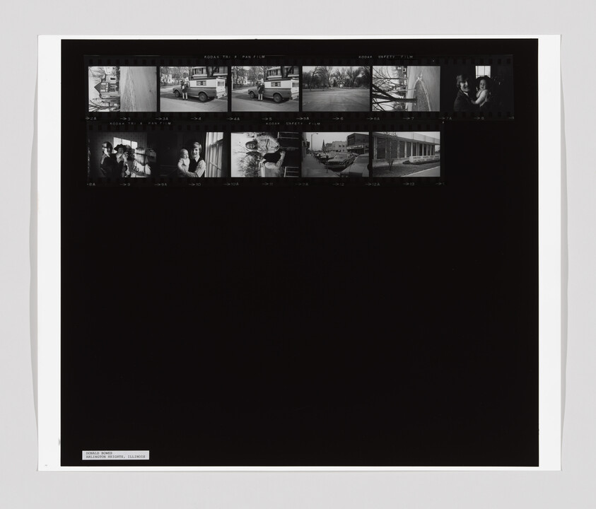 A contact sheet with small black-and-white photos showing people, a van, buildings, and a fountain.