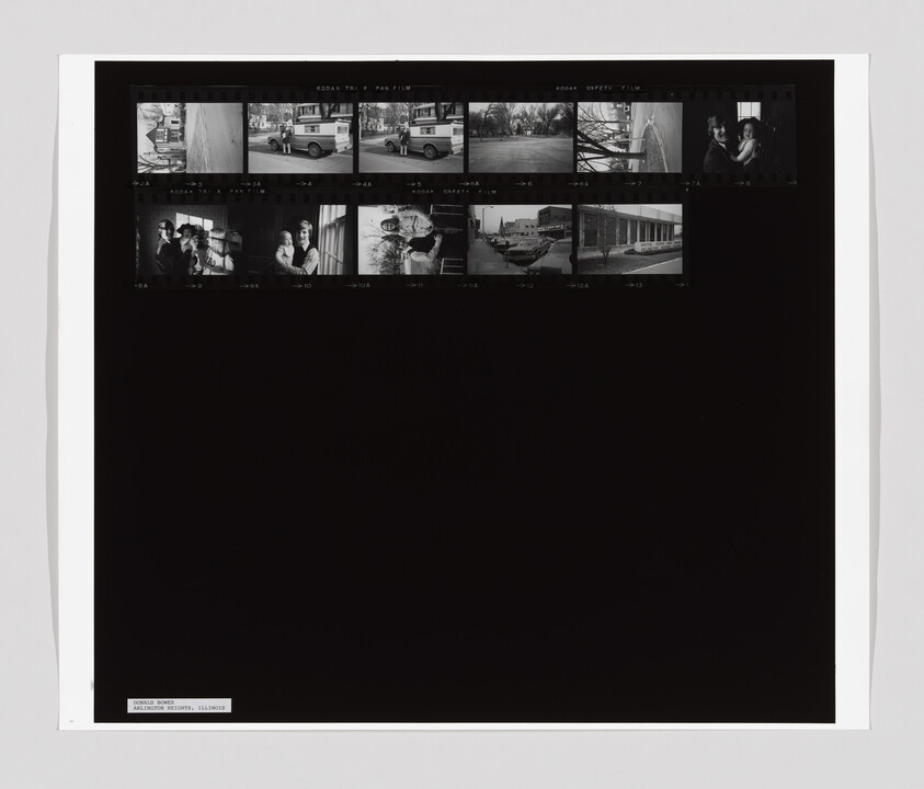 Contact sheet showing small black-and-white film thumbnails of street scenes and people across the top.