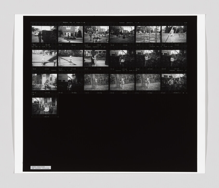 Black-and-white contact sheet showing small photos of children playing outdoors on swings and seesaws.