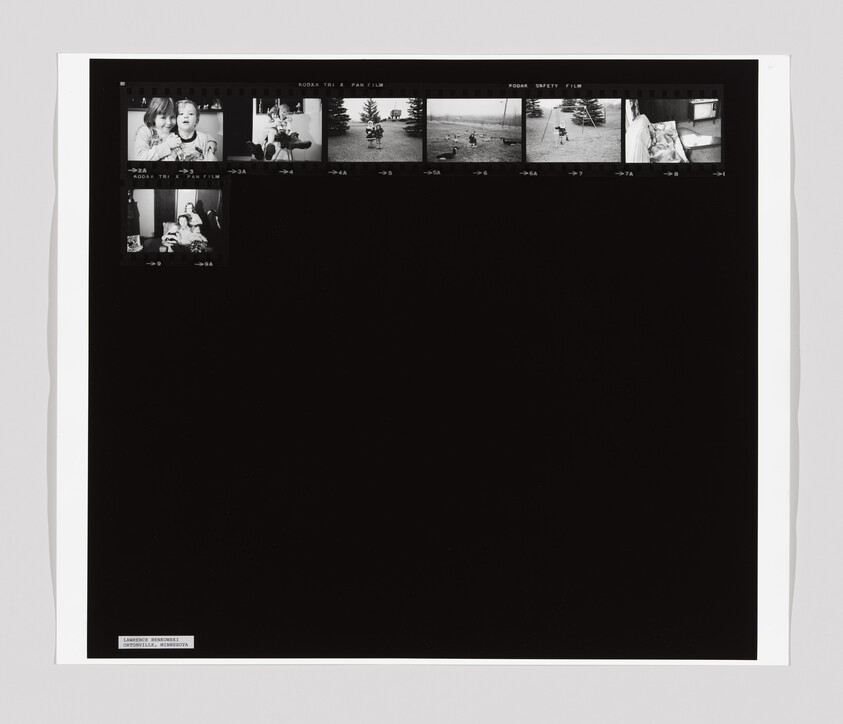 A contact sheet with small black-and-white photos of children playing outside and sitting together indoors.