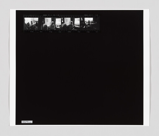 Small film strip at top shows people sitting by a window in a living room.