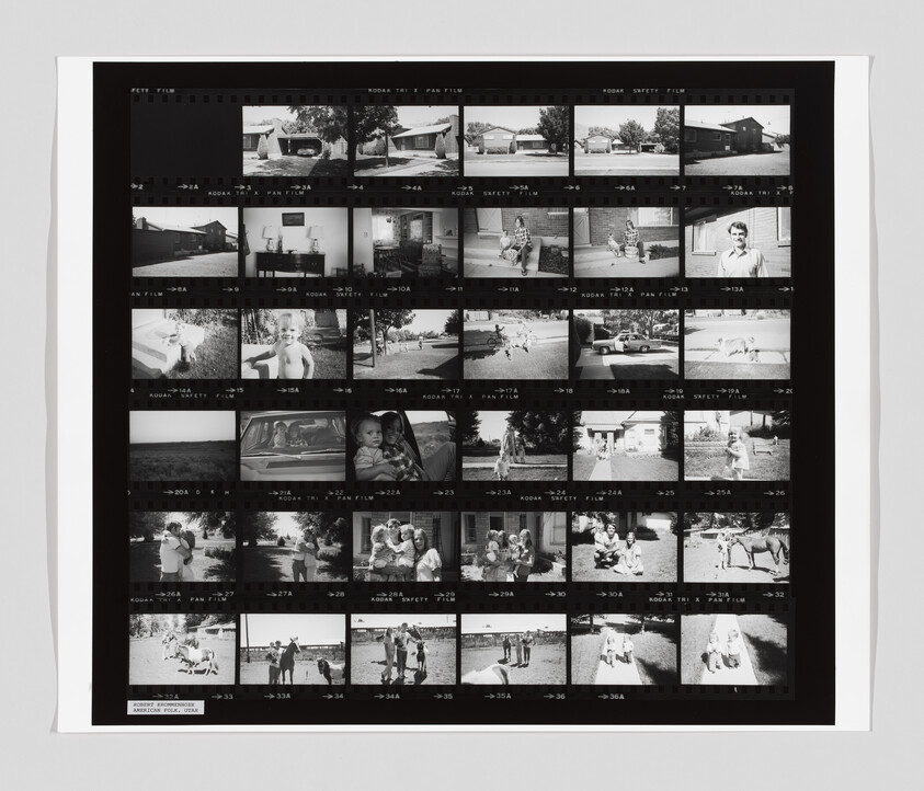 Black-and-white contact sheet showing multiple family snapshots of houses, children, and outdoor activities.