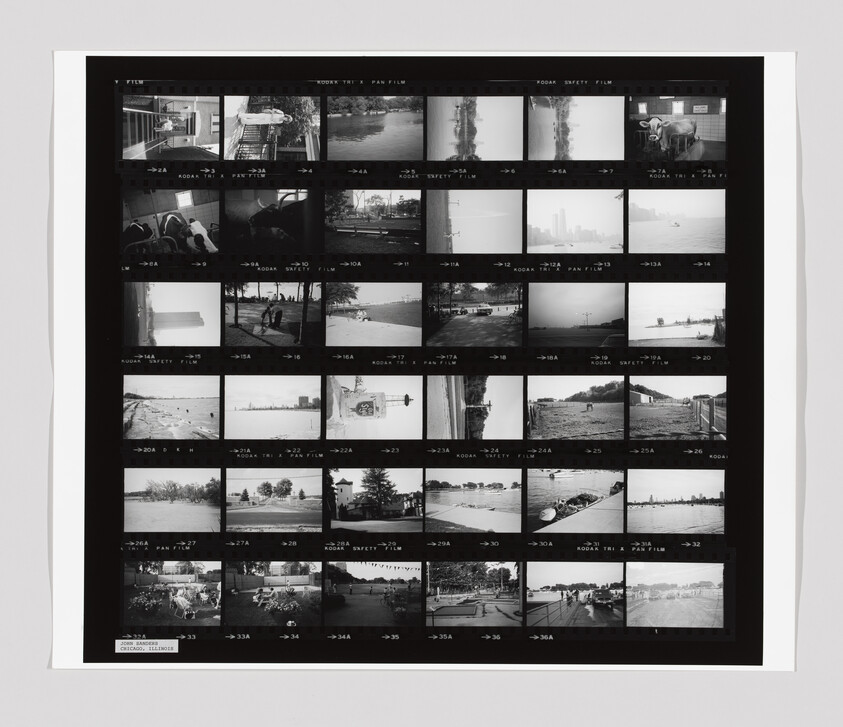 Contact sheet showing multiple black-and-white film frames of outdoor scenes and people.