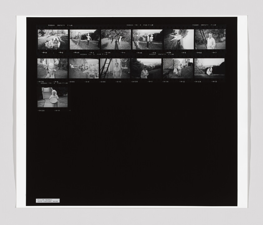 Contact sheet showing small black-and-white frames of people outdoors, including a child holding a bucket.
