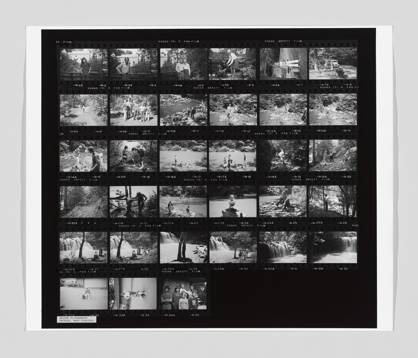 Black-and-white contact sheet showing multiple small photos of people swimming and exploring a river and waterfall.