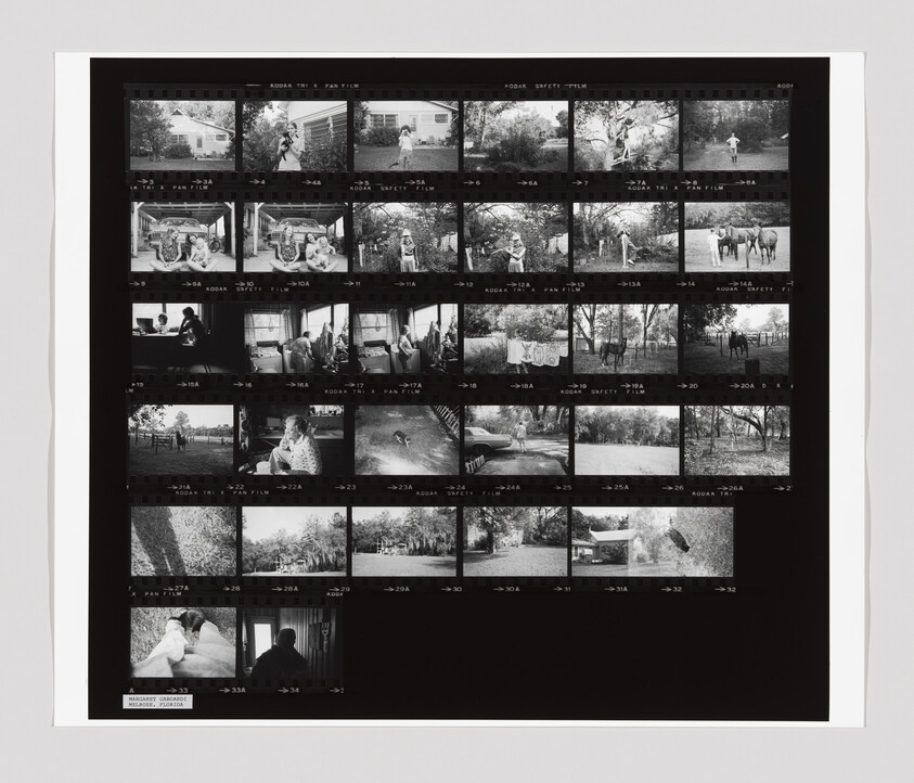Black-and-white contact sheet showing multiple small framed photos of people, animals, and outdoor scenes.
