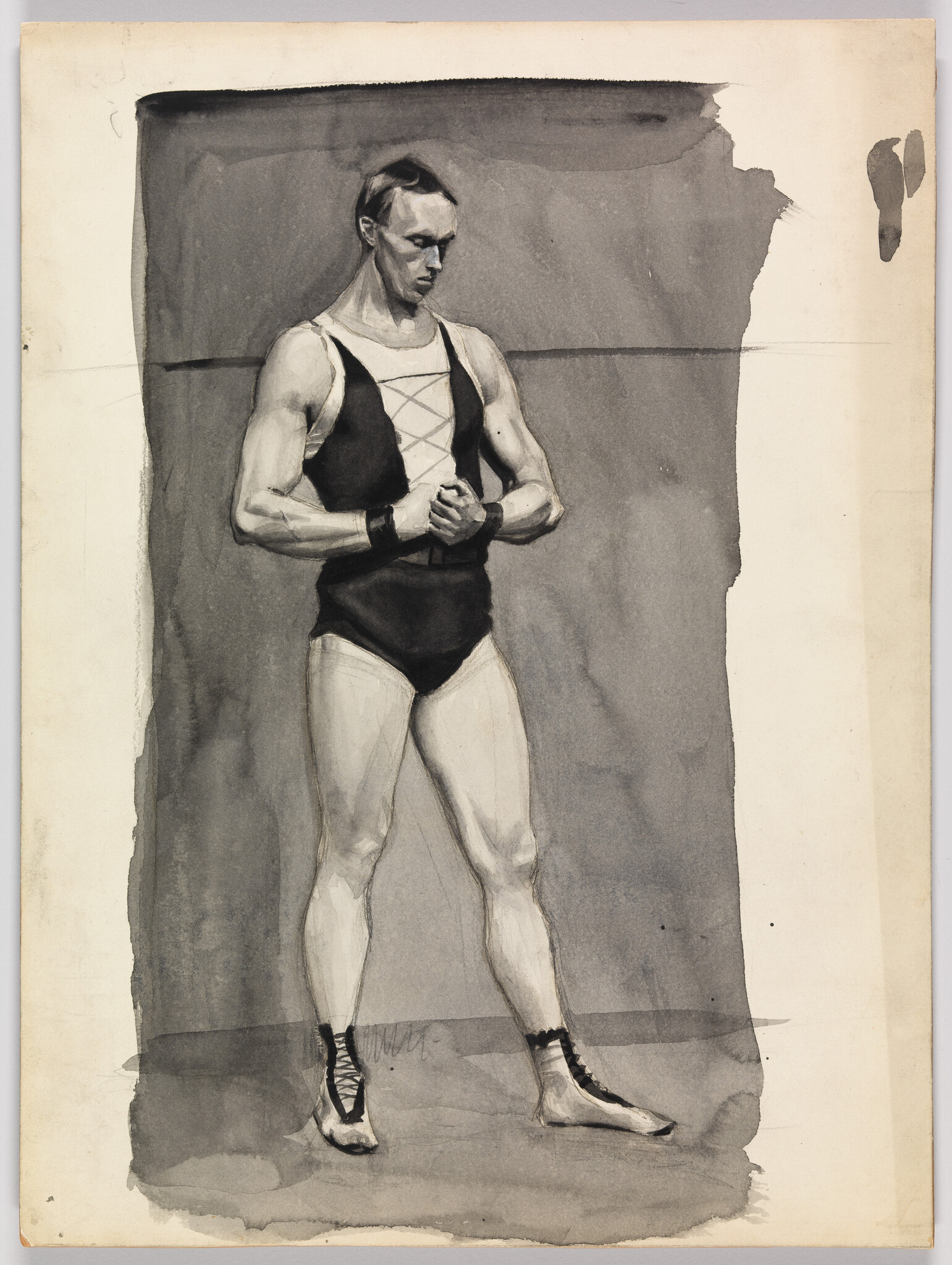 A muscular athlete in a one-piece leotard stands with clasped hands, looking downward.