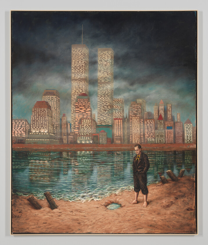 A barefoot boy stands on a riverbank staring at a lit city skyline with twin towers reflected.
