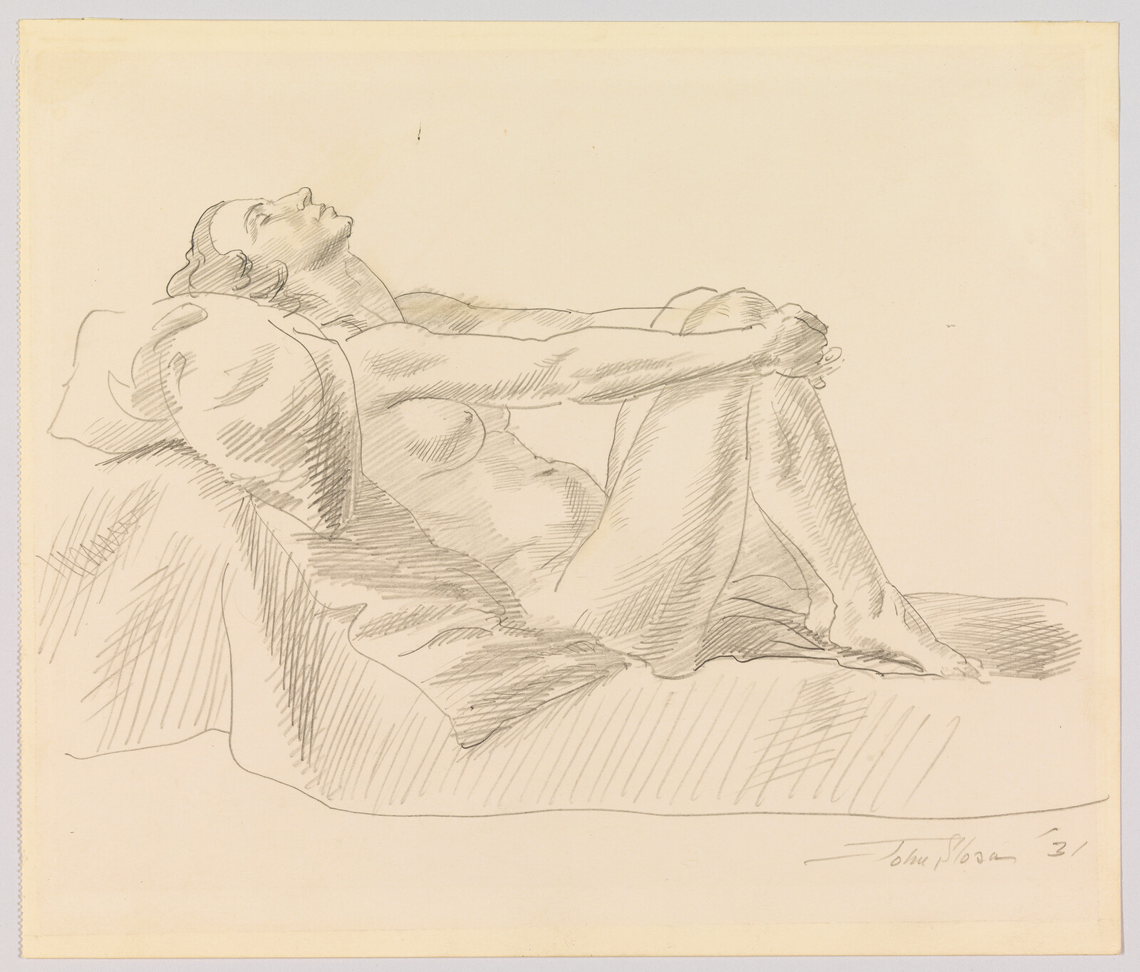 Reclining nude woman leaning back with knees drawn and hands clasped over her shins.