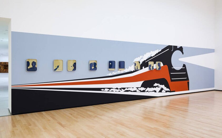 A long gallery mural shows a stylized speeding locomotive with framed silhouette portraits along the wall.