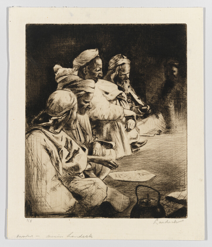 A group of seated elderly men in robes sit together, some holding cups and papers.