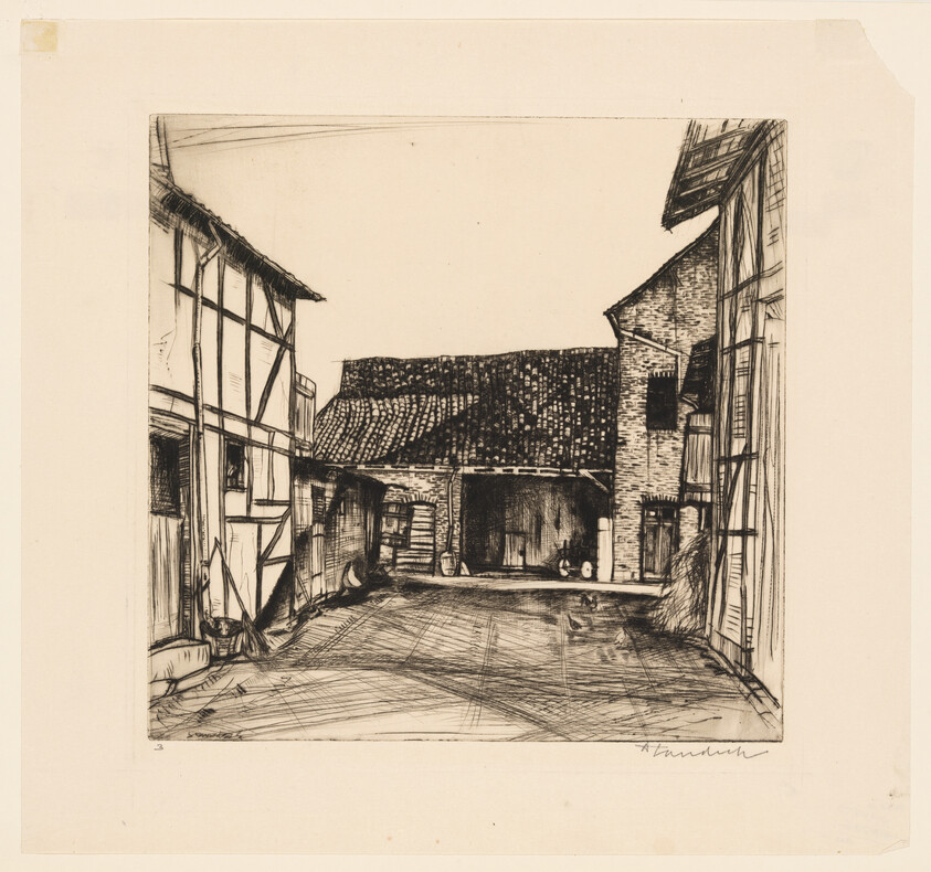 A quiet courtyard framed by timber buildings leading to an open barn with tiled roof.