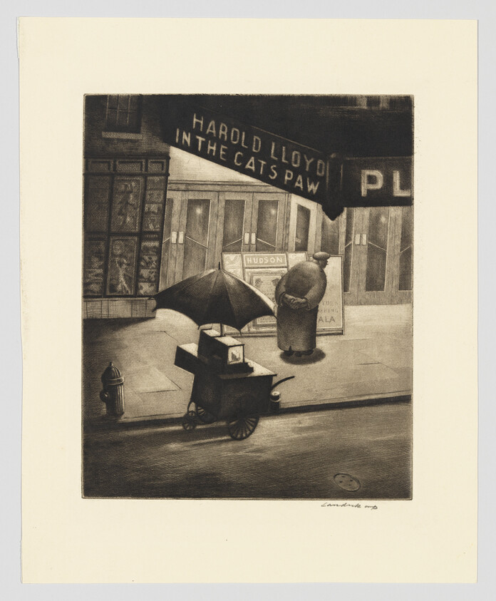 A street vendor with an umbrella cart watches a man reading the theater marquee for Harold Lloyd's The Cat's Paw.