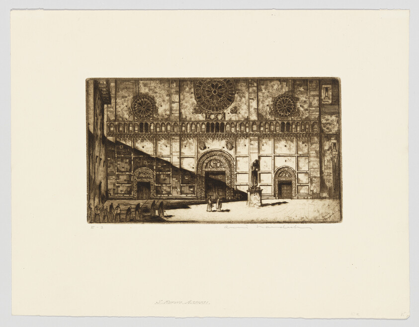 Large ornate church façade with rose windows, a statue in front, and a few people in the sunlit square.