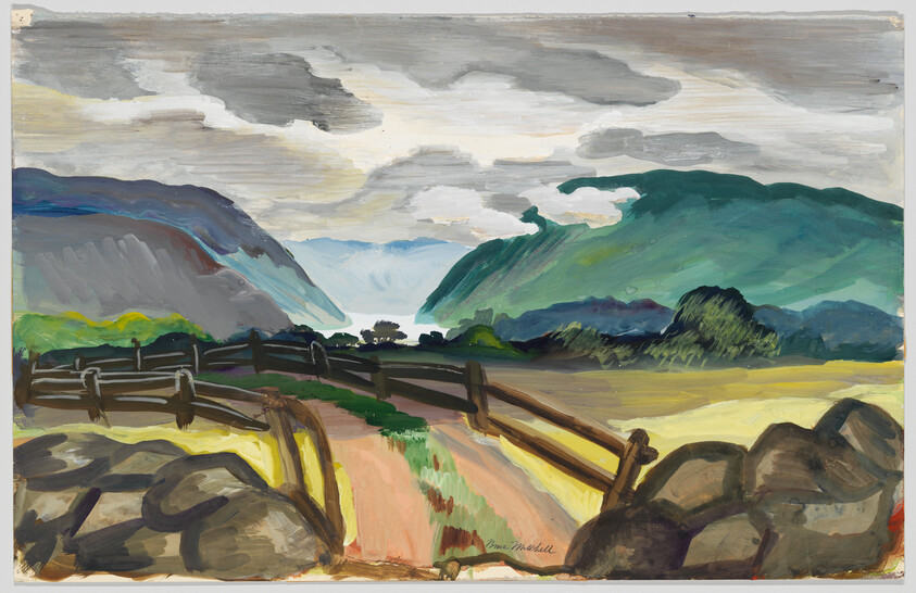 A dirt path between wooden fences leads toward distant green mountains under a cloudy sky.