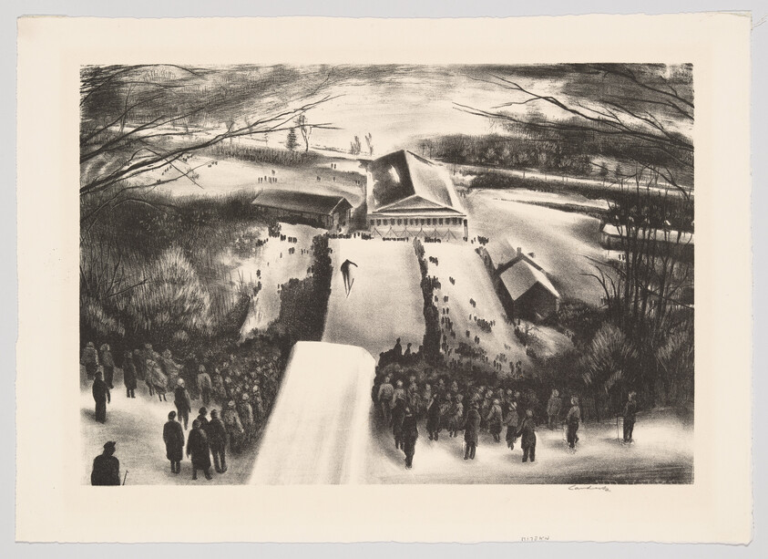 A skier launches from a snowy jump as a large crowd watches near winter buildings.