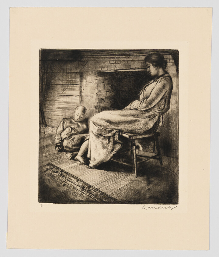 A woman sits on a chair with her arms crossed while a child sleeps on the floor.