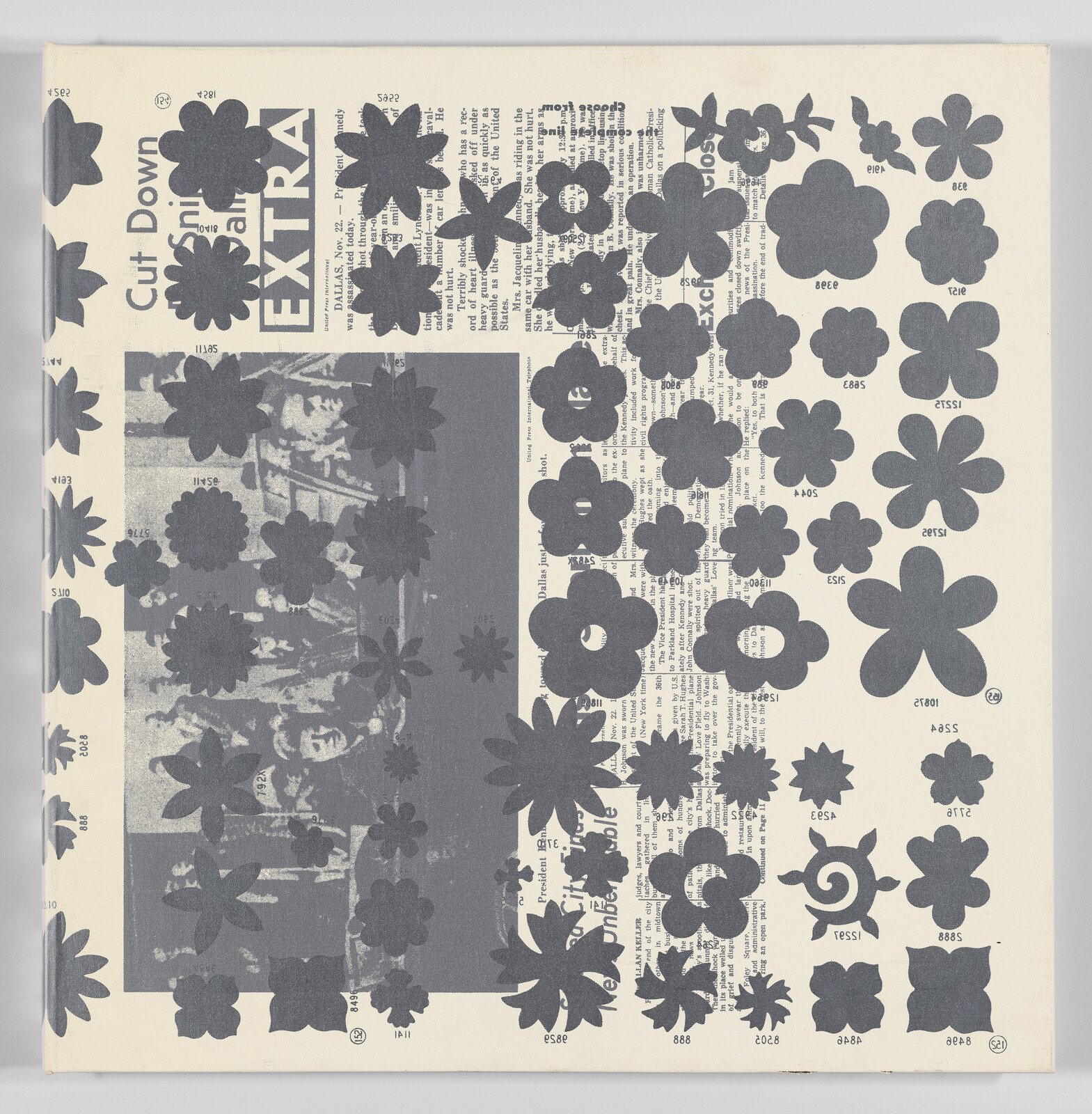 Black flower shapes cover a newspaper page with the word "EXTRA" and a faded photo of people visible.