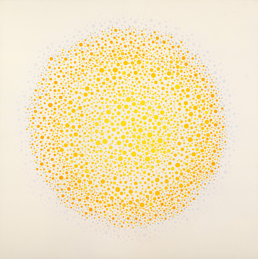 Large circular field of yellow and orange dots forming a gradient that fades toward the edges.