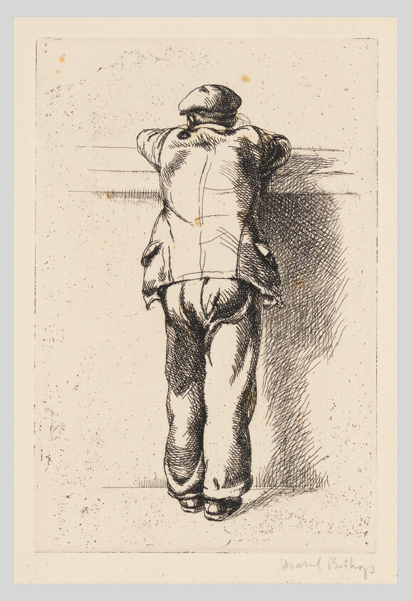 A man wearing a cap and coat leans with his arms on a railing, seen from behind.