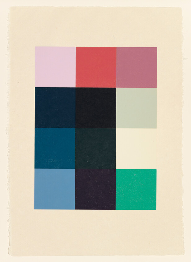 A centered 4x3 grid of colored squares and rectangles on a beige sheet.