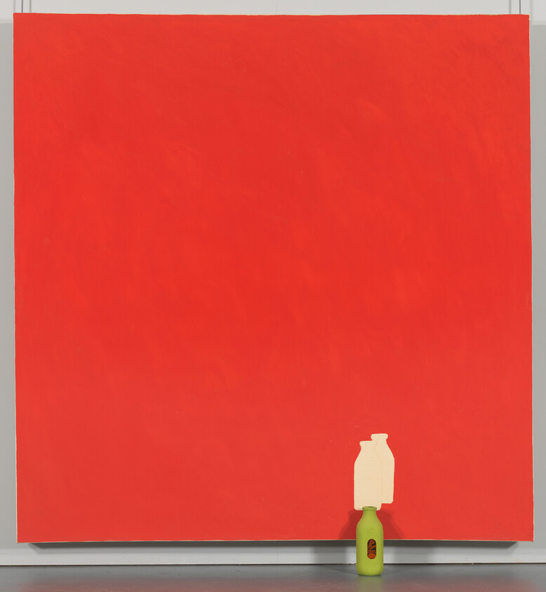 Large red square painting with a small green bottle holding two white cutout shapes at the bottom.