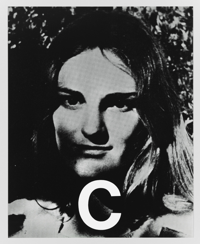 Black and white photo of a woman's face with a large letter "C" superimposed on the lower right side. The image has a high-contrast, grainy texture, and the background is indistinct.