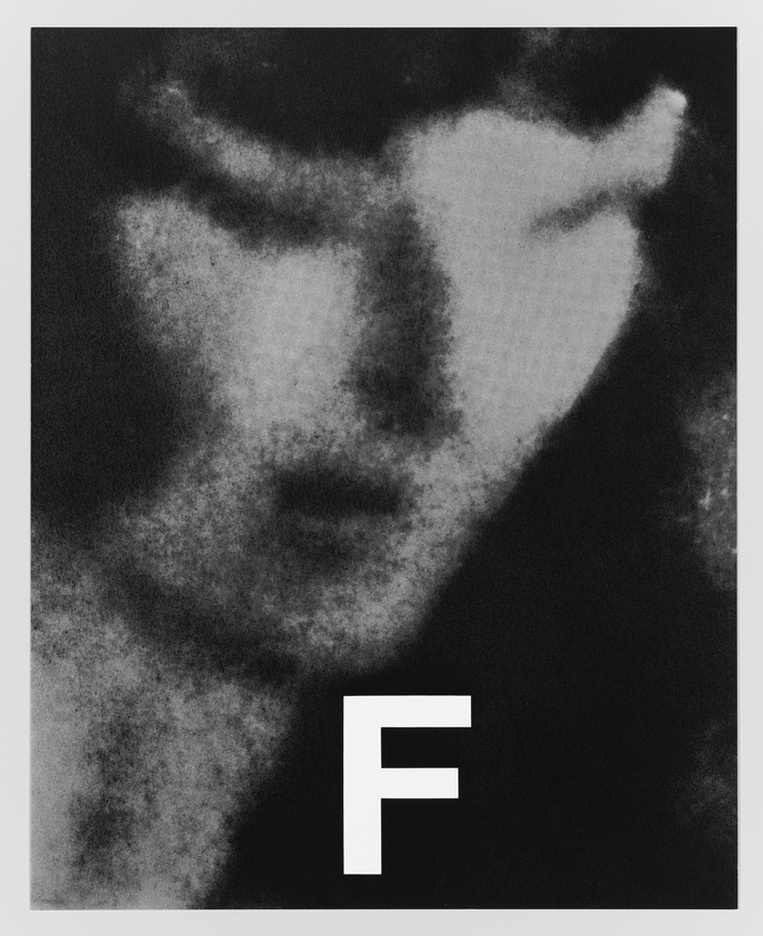 A monochromatic image featuring a stylized, high-contrast depiction of a face with closed eyes, possibly rendered in a grainy, dot-matrix style. A large, bold letter "F" is prominently displayed in the lower part of the image.