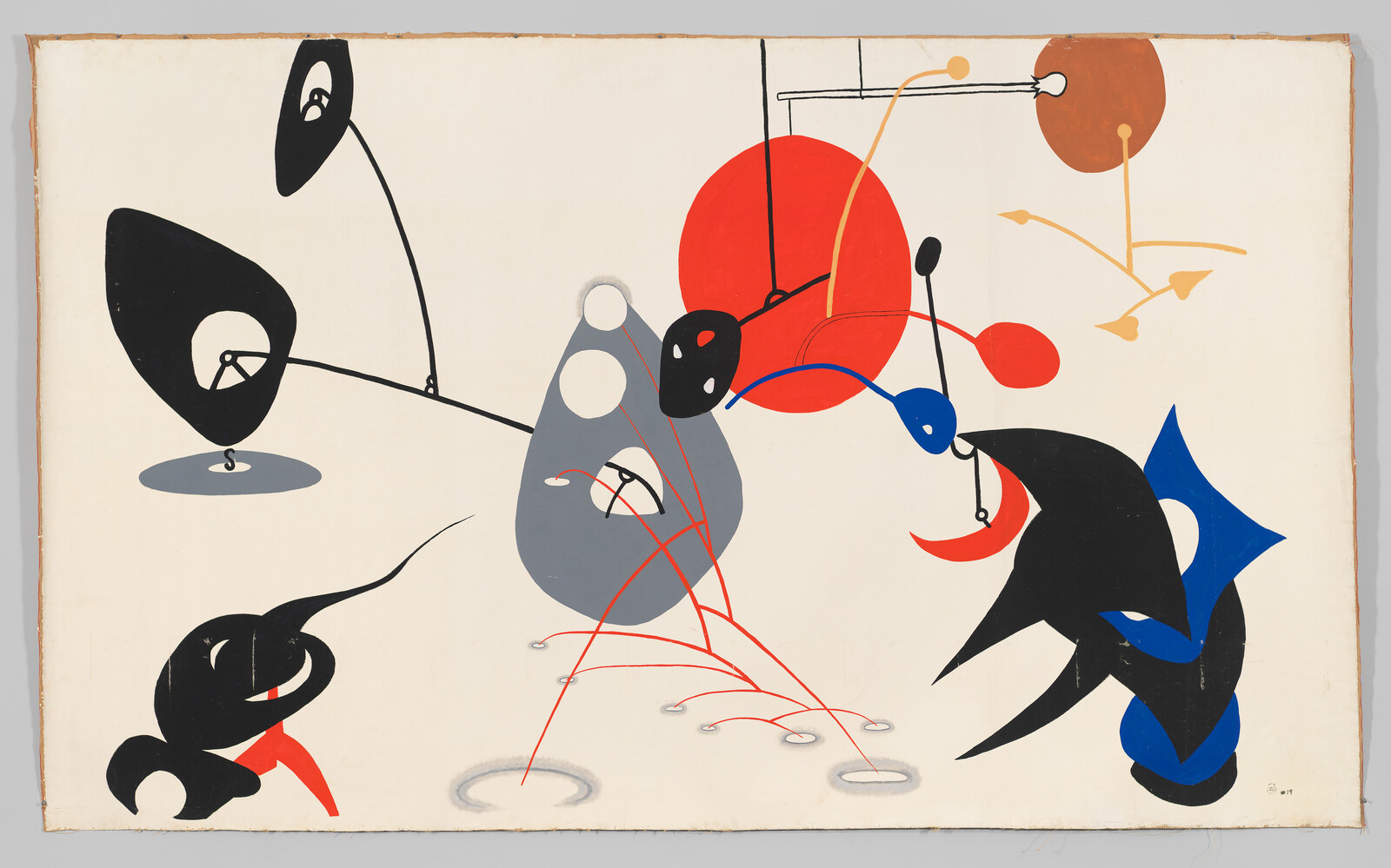 Abstract mobile shapes with red circle and suspended black, blue, and gray organic forms.