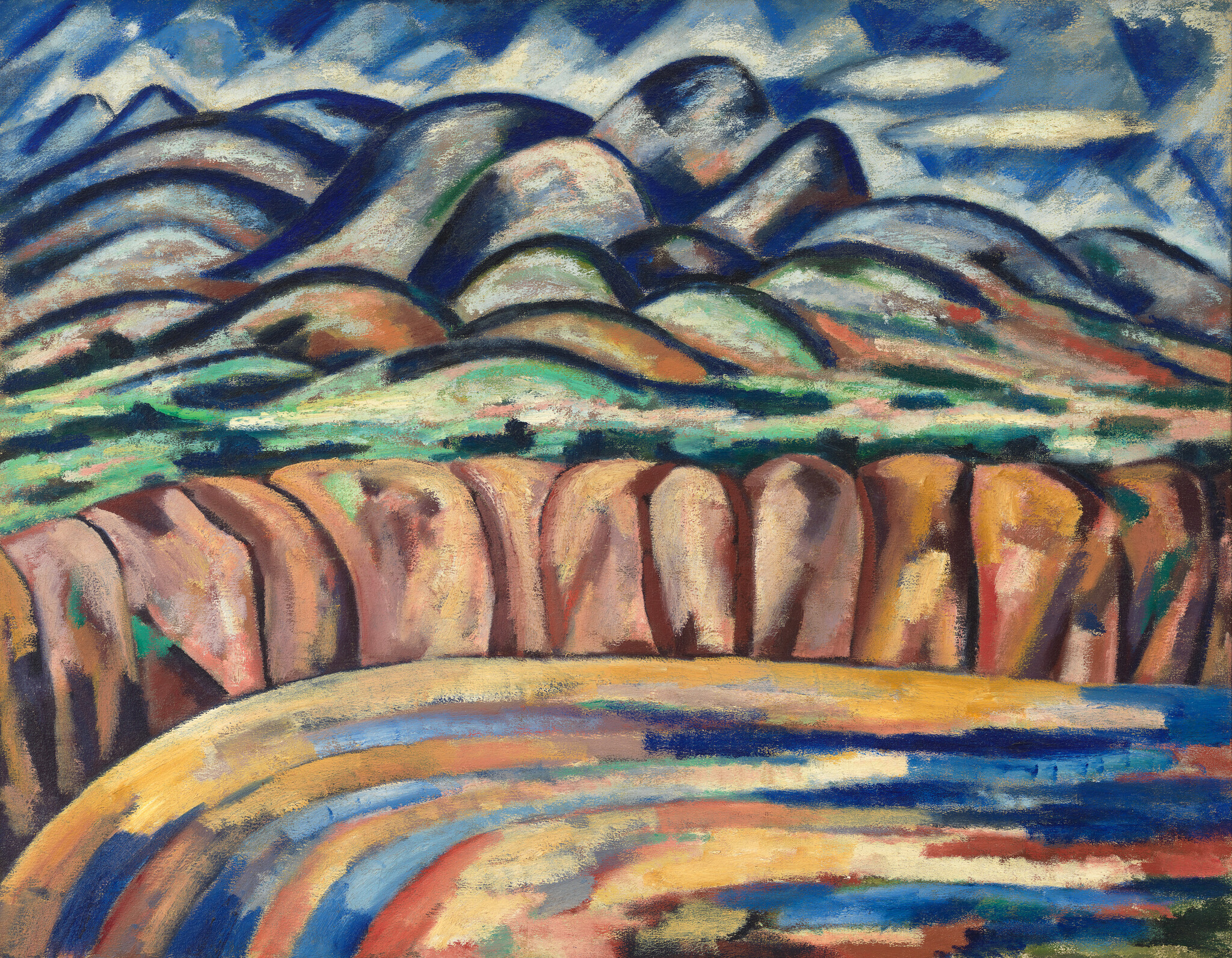 Rounded multicolored hills rise behind a banded cliff and curved striped shoreline.