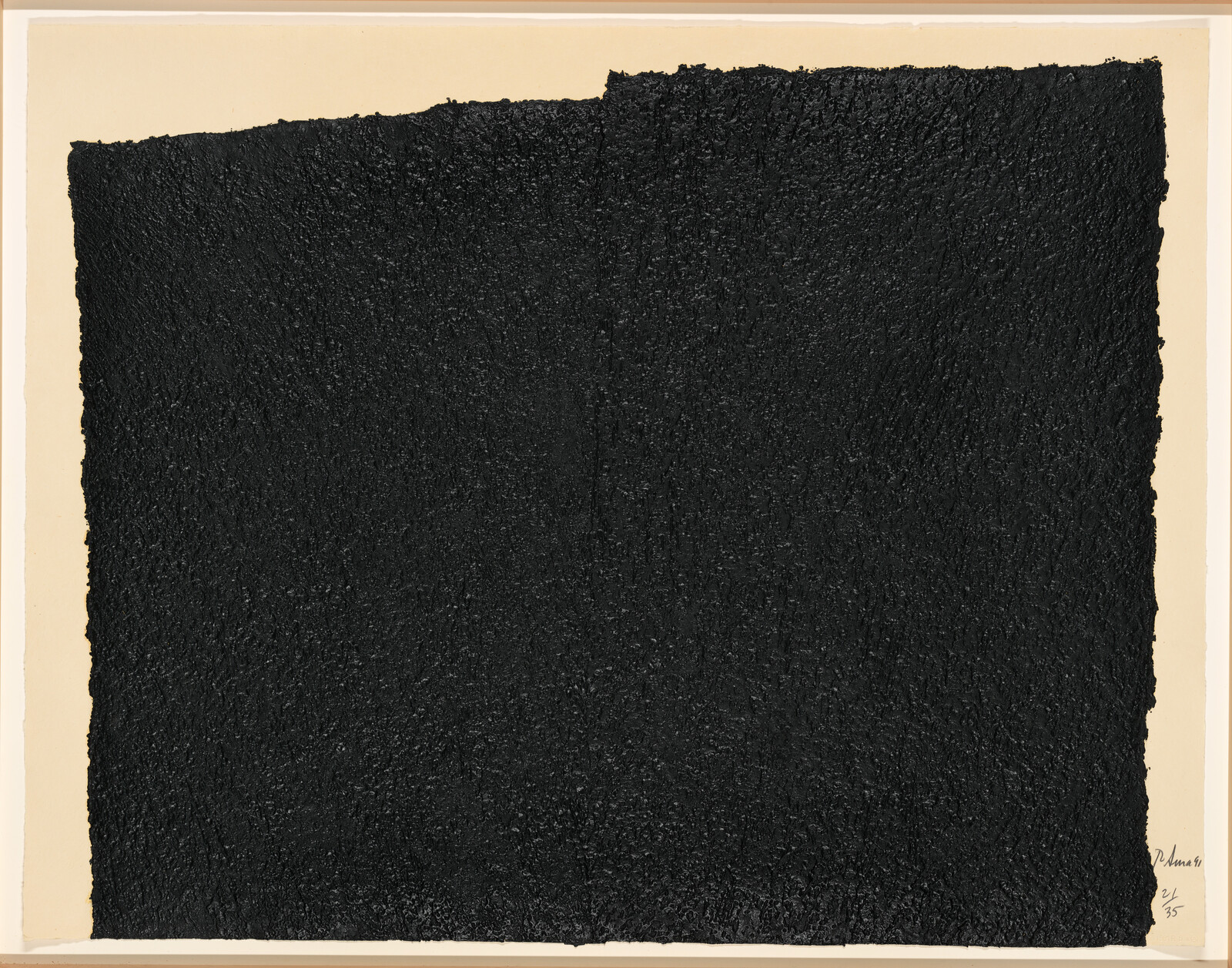 A large textured black rectangle covers most of a cream sheet of paper.