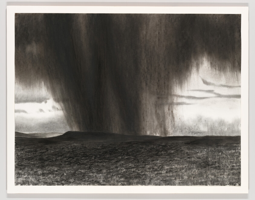 A massive dark storm cloud or curtain of rain descends over a flat, empty plain.