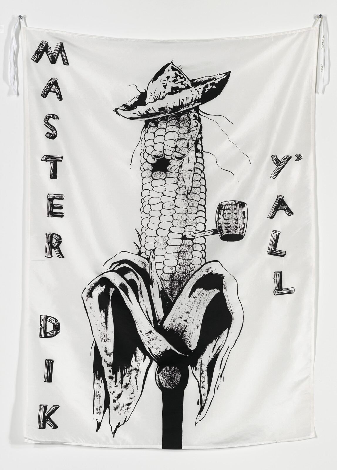 A corn cob wearing a hat and smoking a pipe with the words "MASTER DİK" and "Y'ALL."