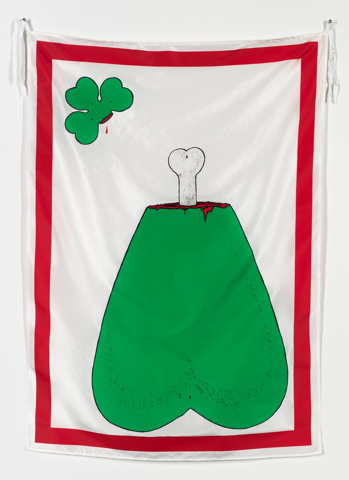 Large white banner with green heart-shaped mound topped by a bone and bleeding clover.