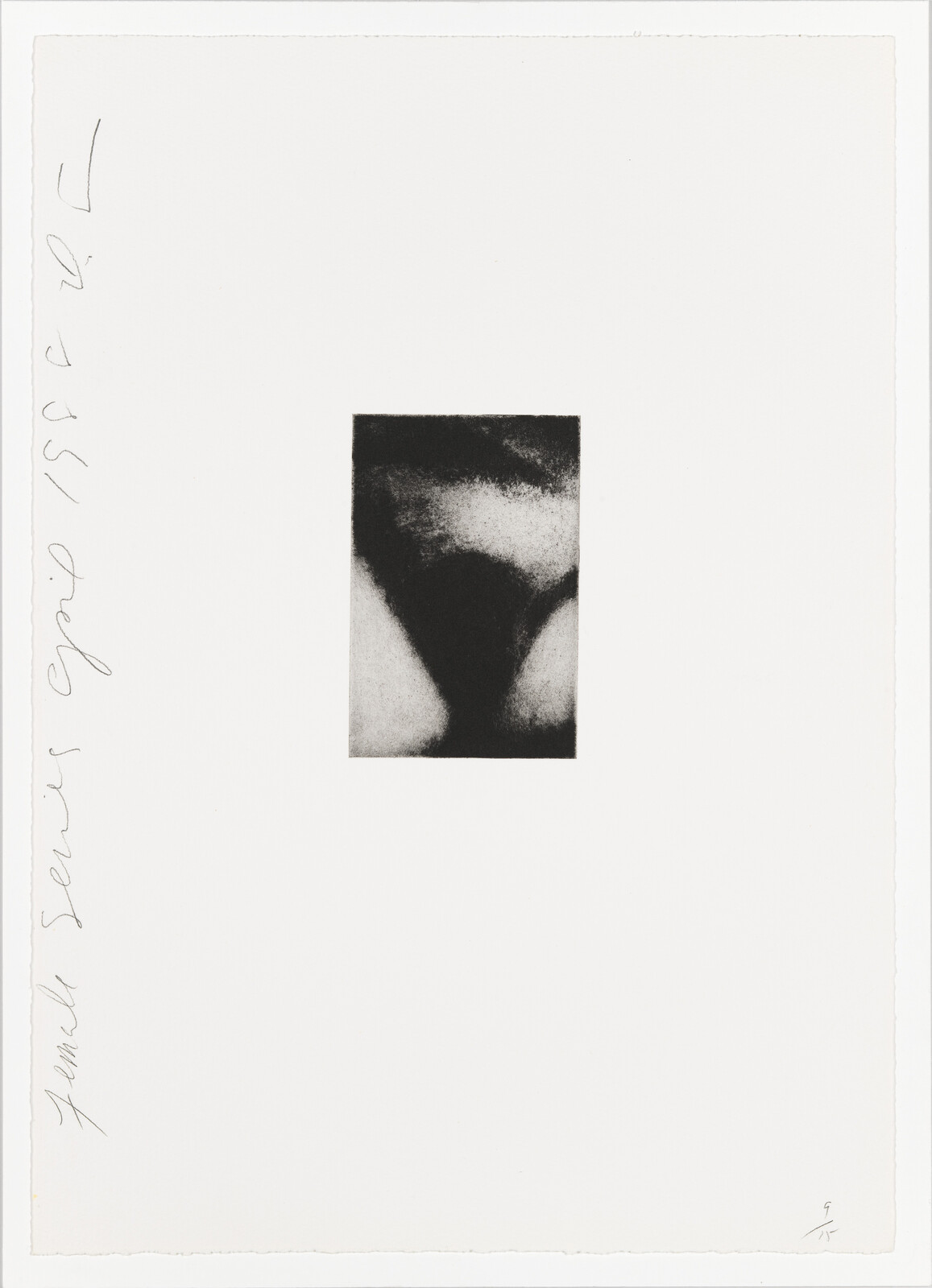Small black-and-white abstract rectangle centered on large white paper with handwritten notes.