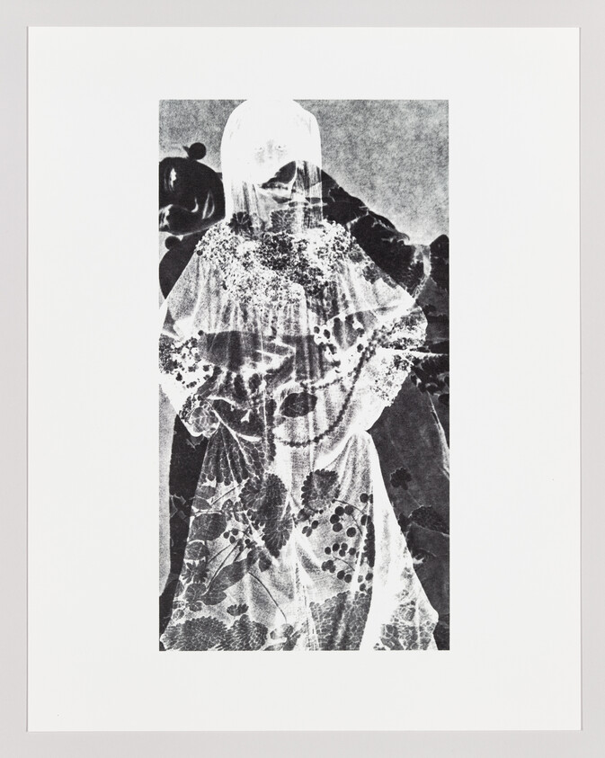 A veiled woman in a floral patterned dress stands with hands on hips in a high-contrast print.