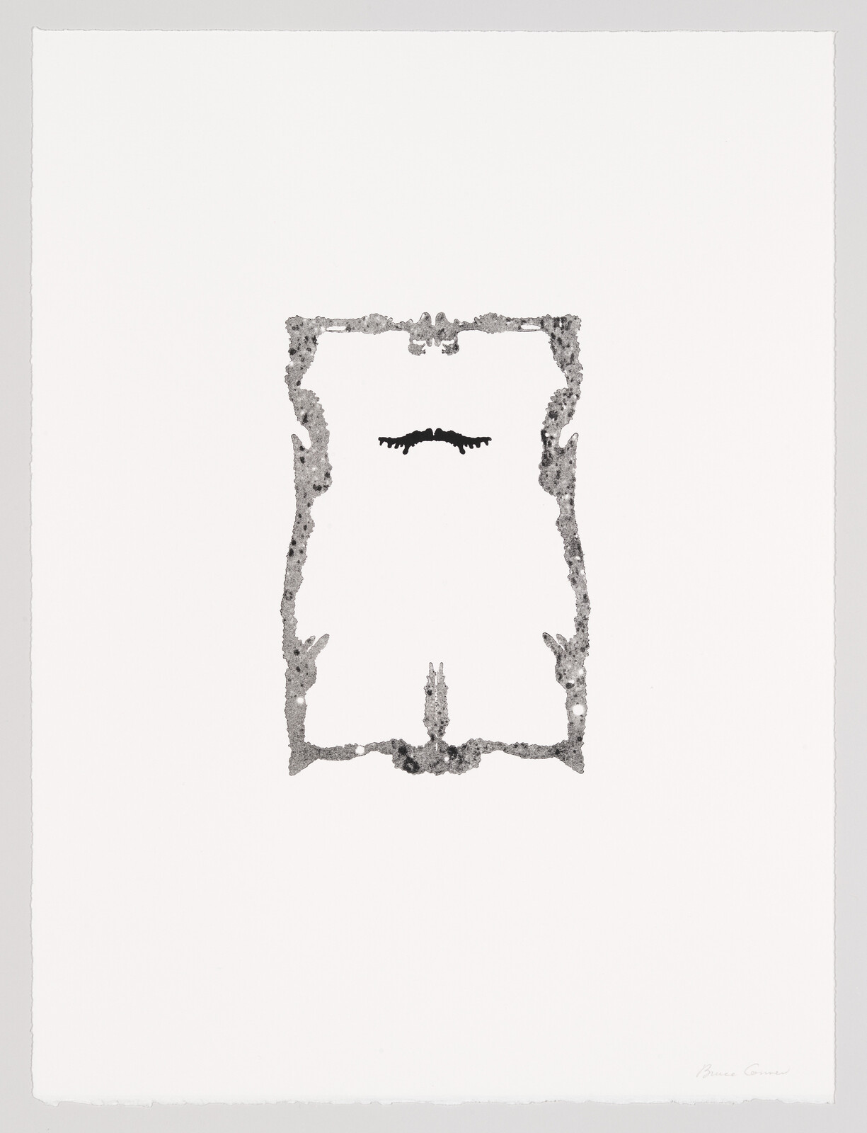 A textured gray ornamental rectangle with a small black curved mark near the top center.