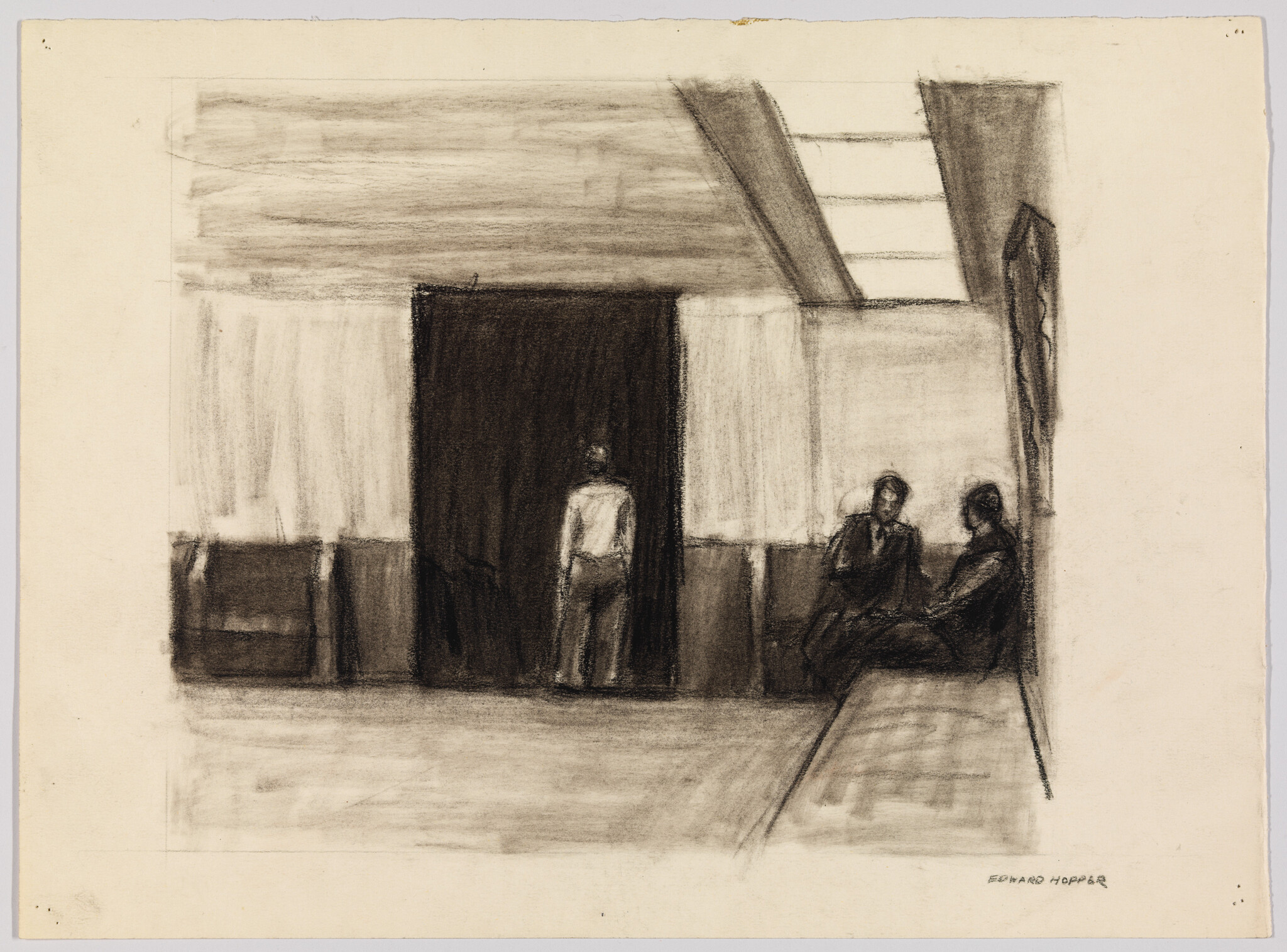 A person stands facing a dark doorway while two others sit and talk in a waiting room.