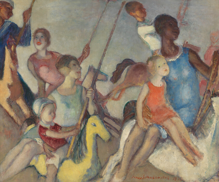 Children of different ages ride colorful carousel horses and hold poles while looking upward.