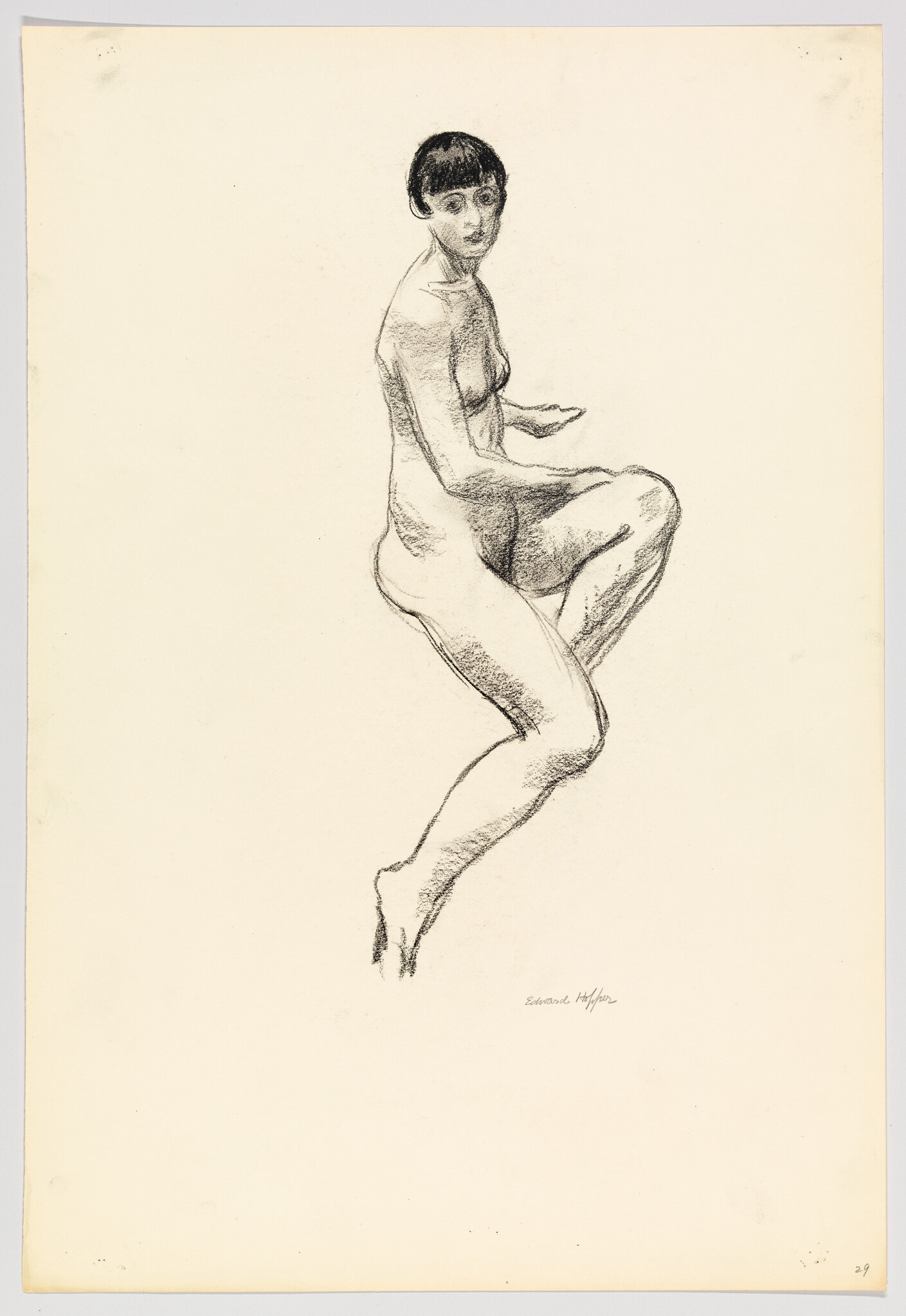 A charcoal sketch of a seated nude woman with a raised knee looking over her shoulder.