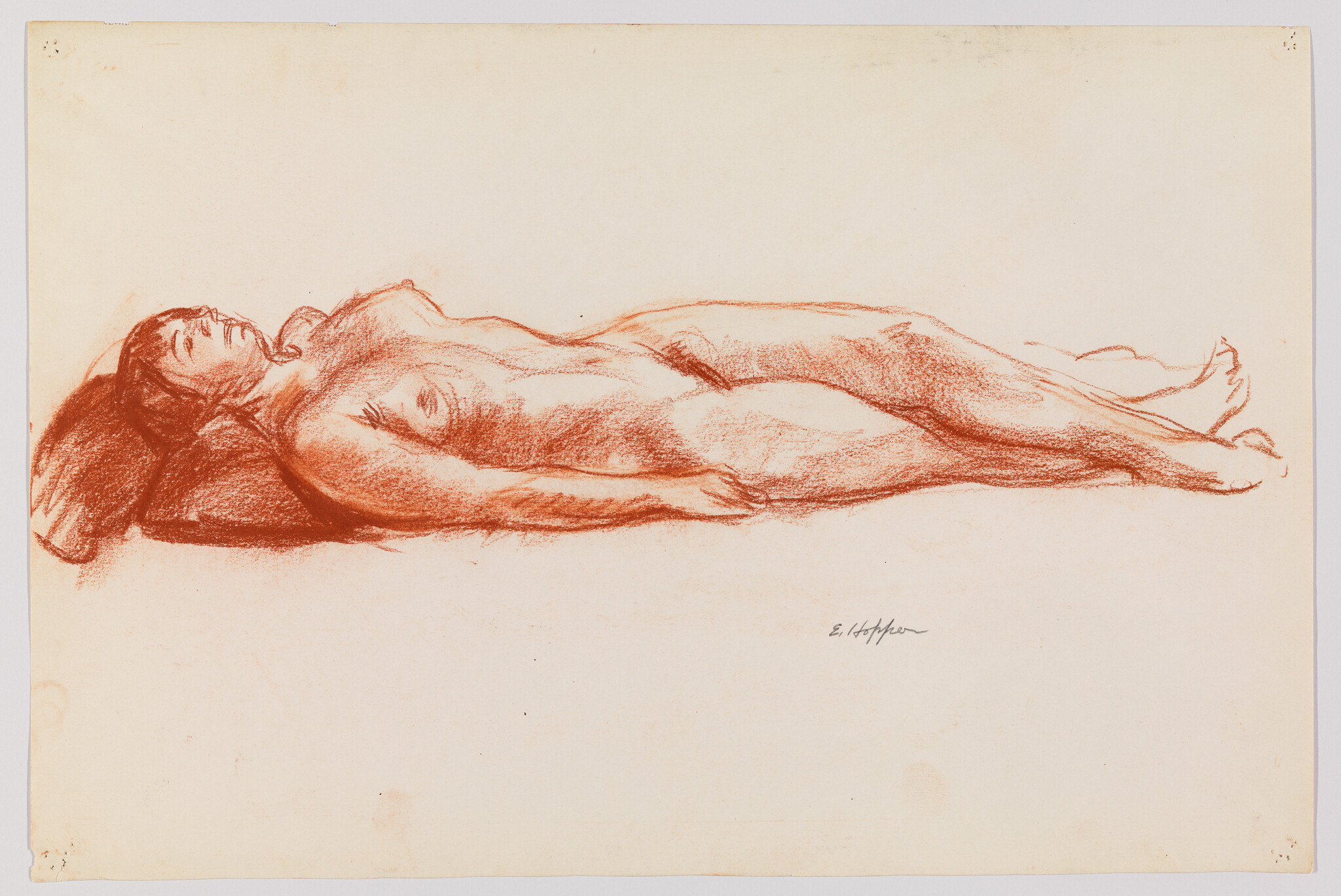 A reclining nude woman resting on a pillow, drawn in red chalk.