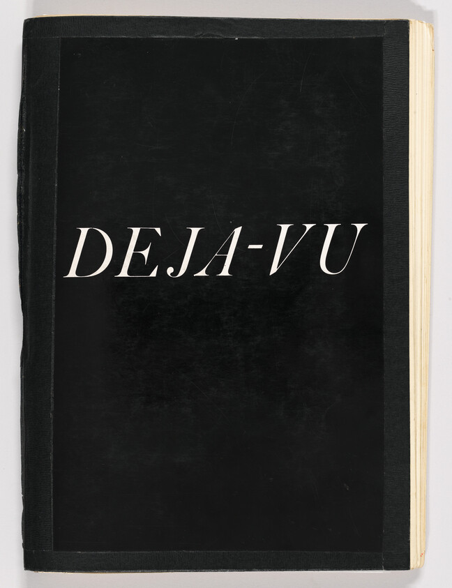 Black-covered book with large white title "DEJA-VU" centered on the front cover.