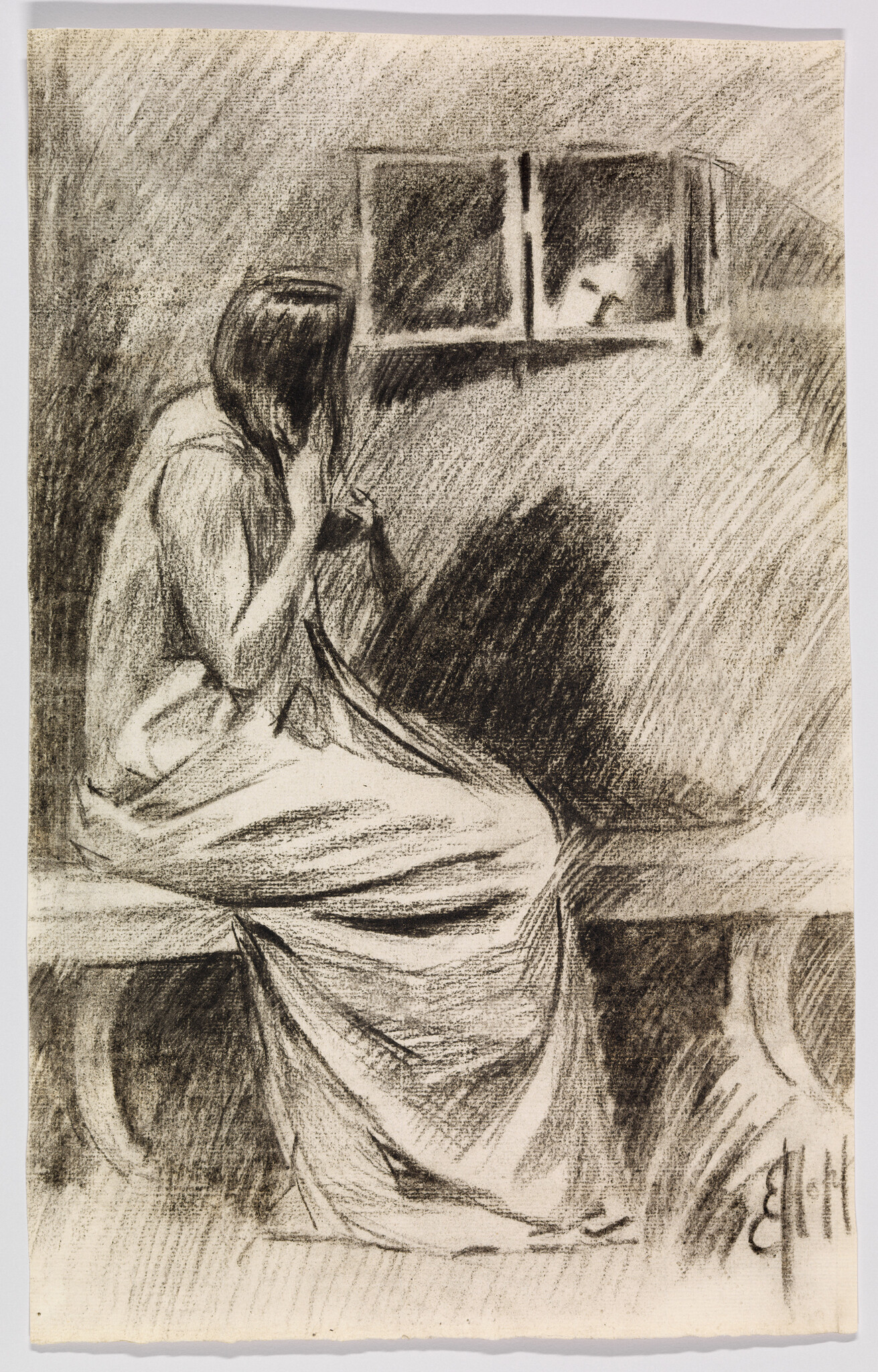 A seated woman in a long dress covers her face while looking toward a small window.