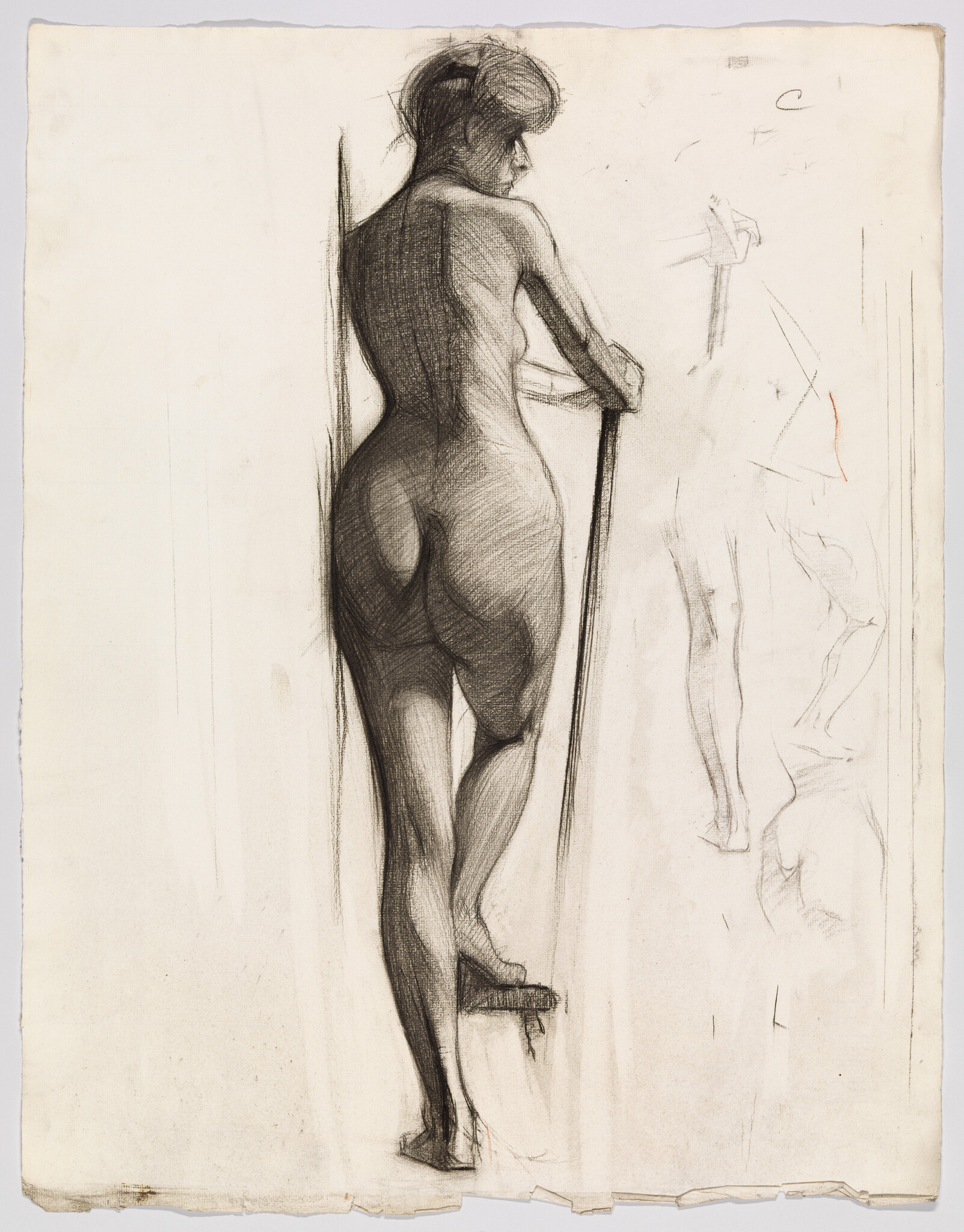 Nude woman standing with one foot on a small block, leaning on a long staff.