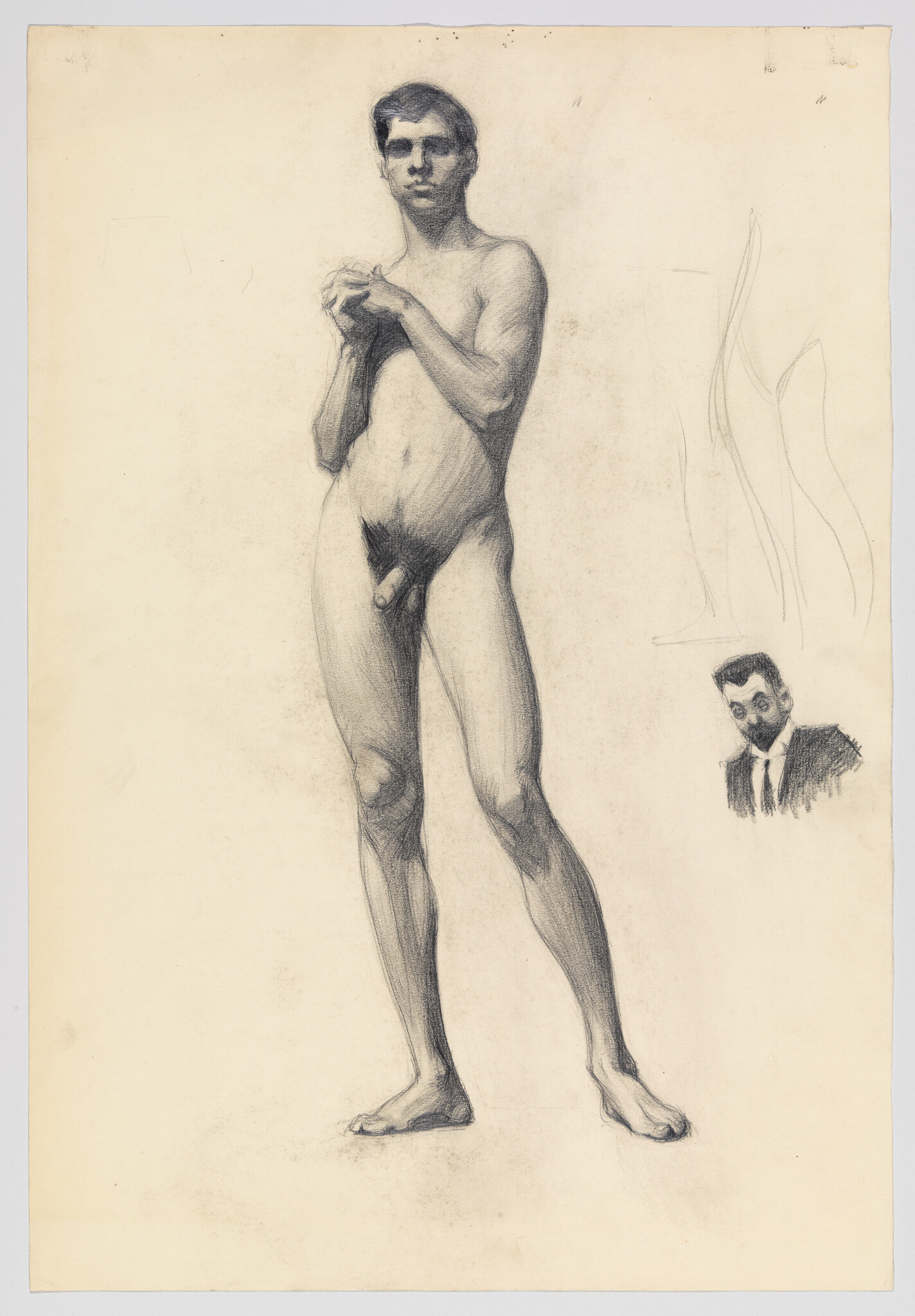A standing nude male model posed with hands clasped, drawn in a detailed pencil sketch.