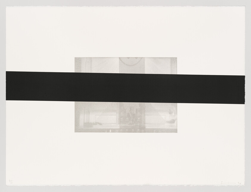 A wide black horizontal band crosses the center of a pale rectangular print with faint interior details.