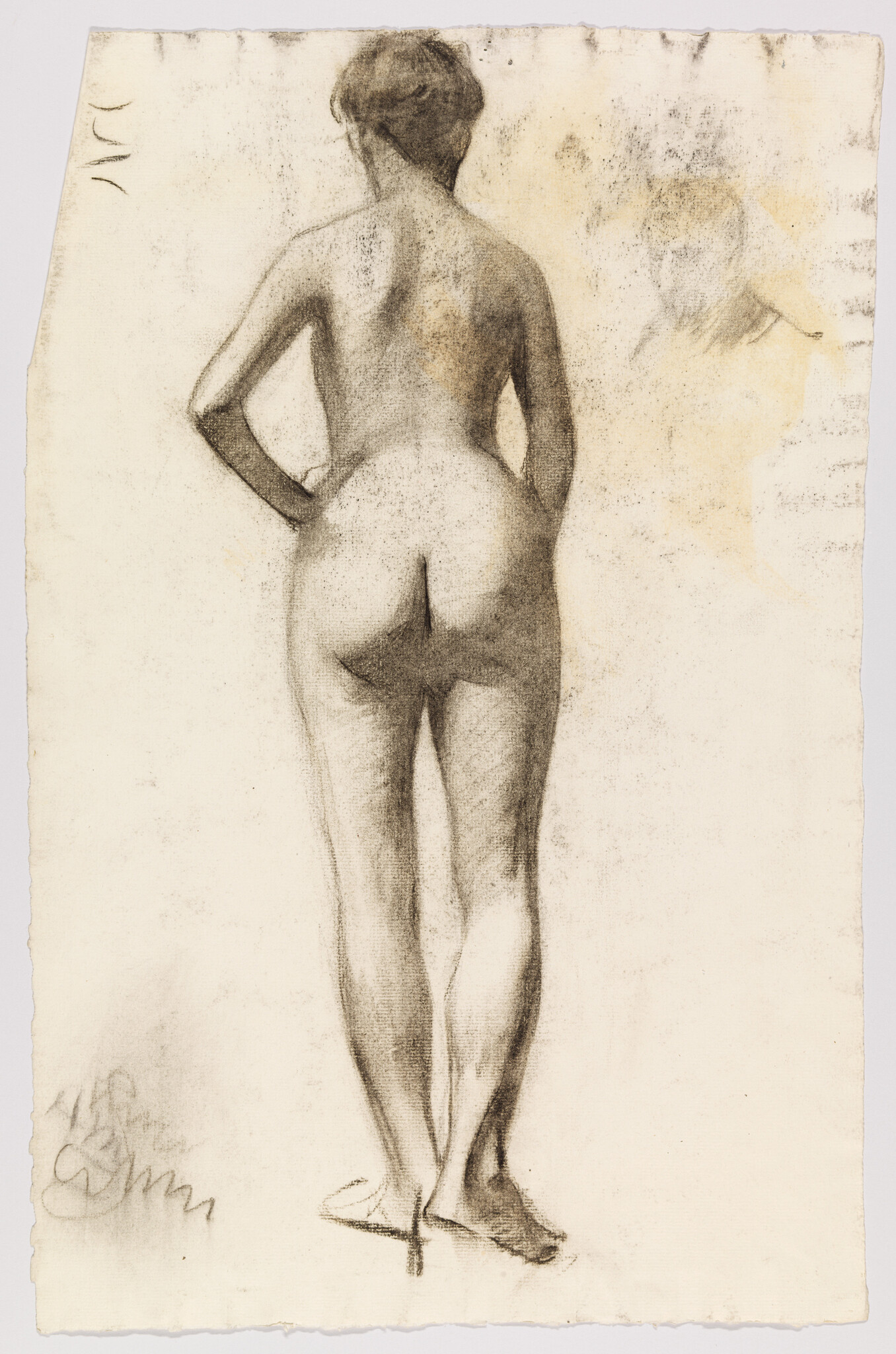 Nude woman standing with hands on hips, viewed from the back in a charcoal sketch.