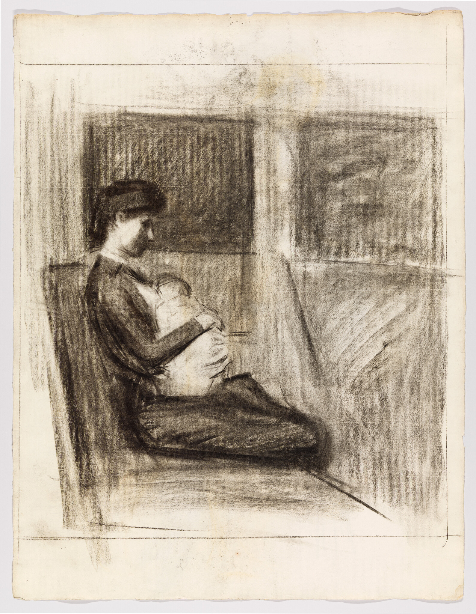 A woman sits on a bench holding a sleeping baby close to her chest.